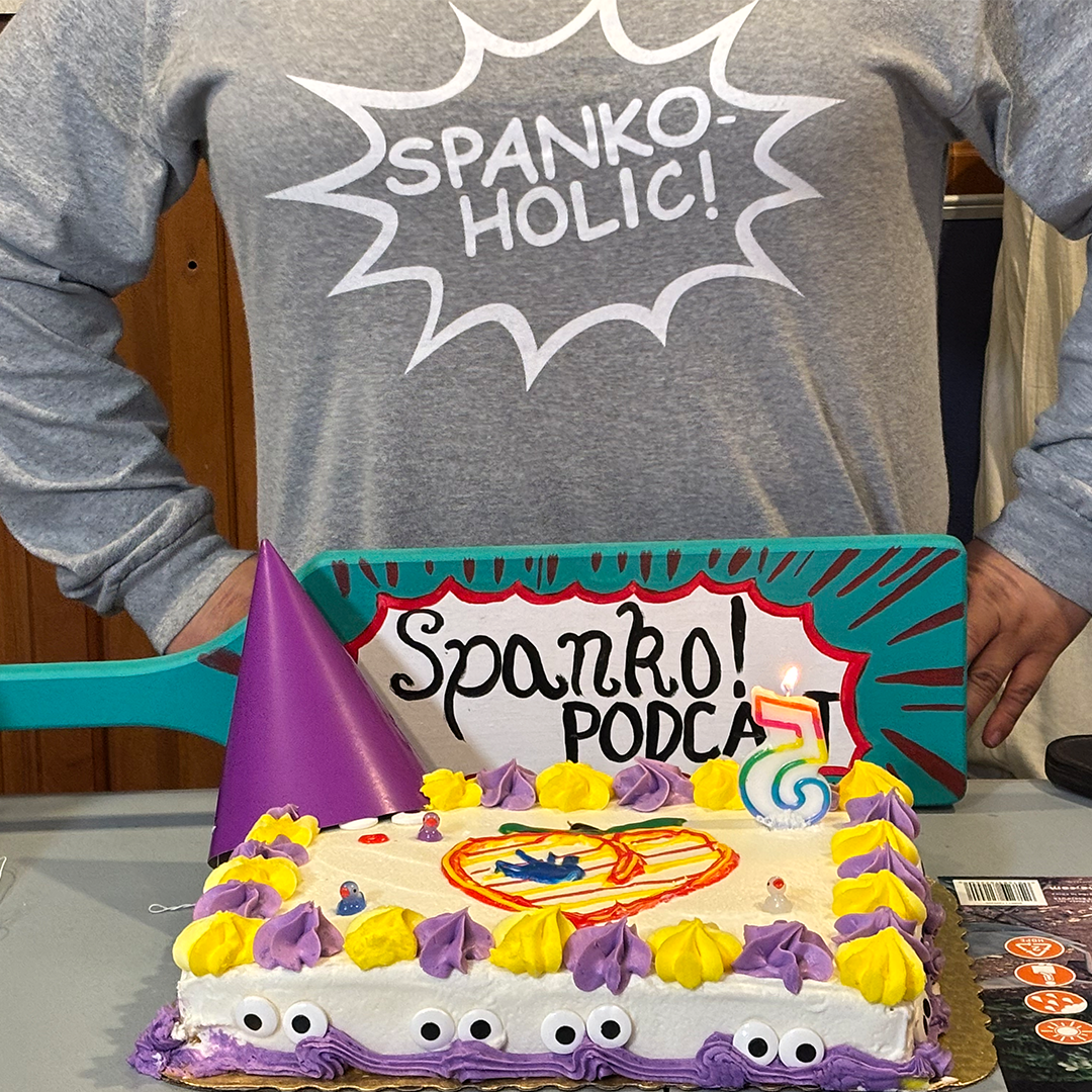 Cake with Googley Eyes, a Peach-shaped Butt with a handprint, and a SpankoPodcast paddle